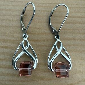Elegant Silver Celtic Knot Drop Earrings With Pink Crystal Cube